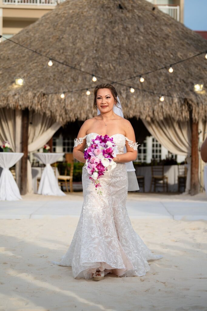 Bride walking aisle at wedding at Hyatt Regency Aruba