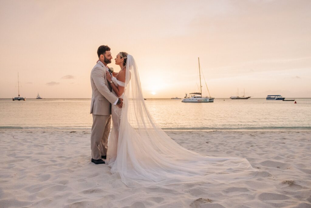 Bride and groom on Aruba beach after elopement