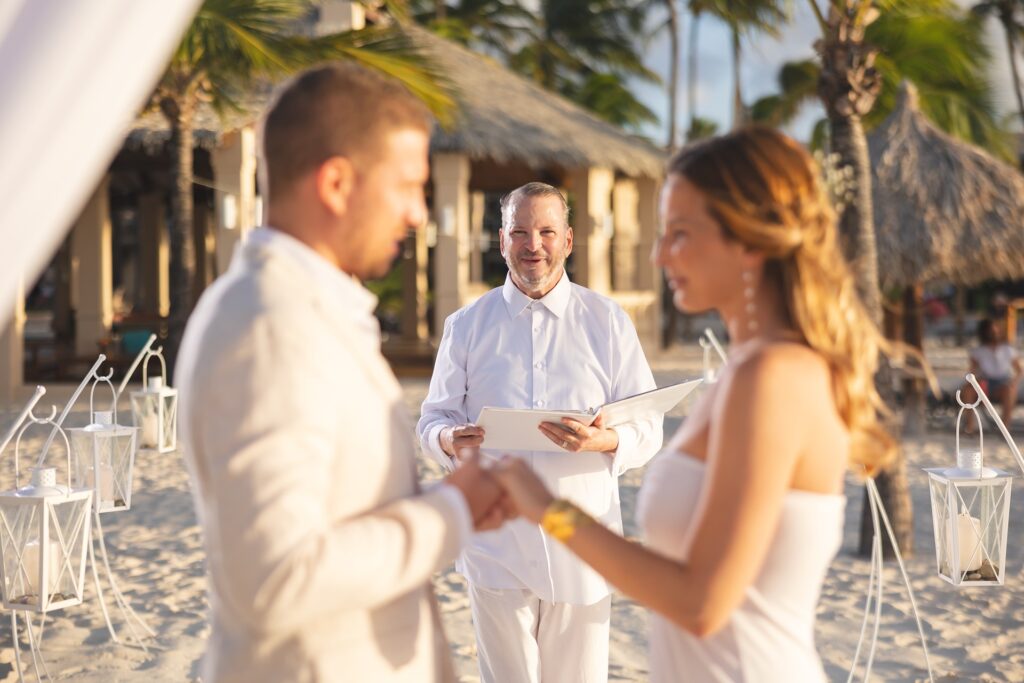 Aruba officiant performing vows for bride and groom elopement