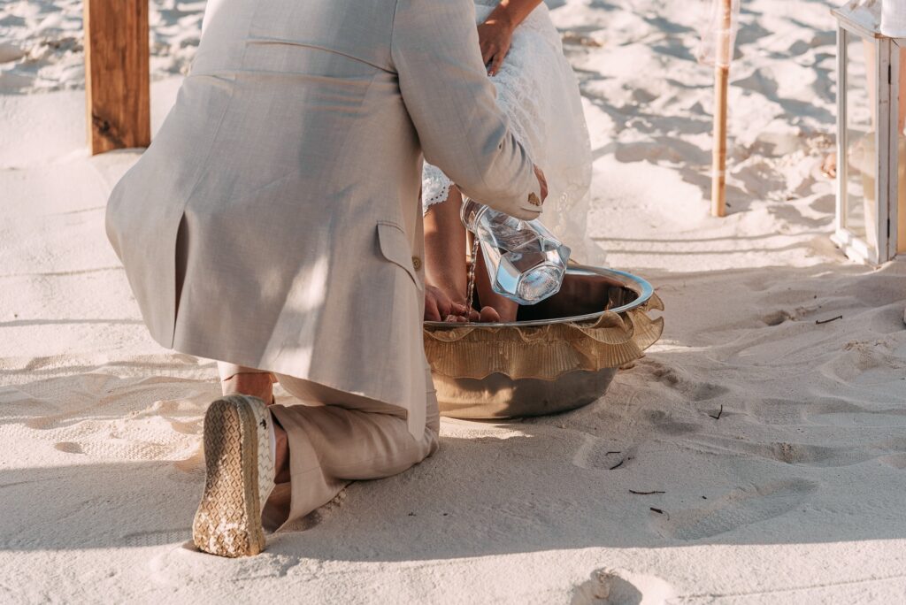 Foot washing wedding ceremony ritual at Aruba elopement