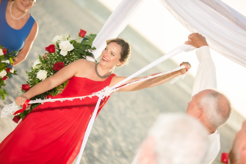 Bride performing handfasting at Aruba elopement