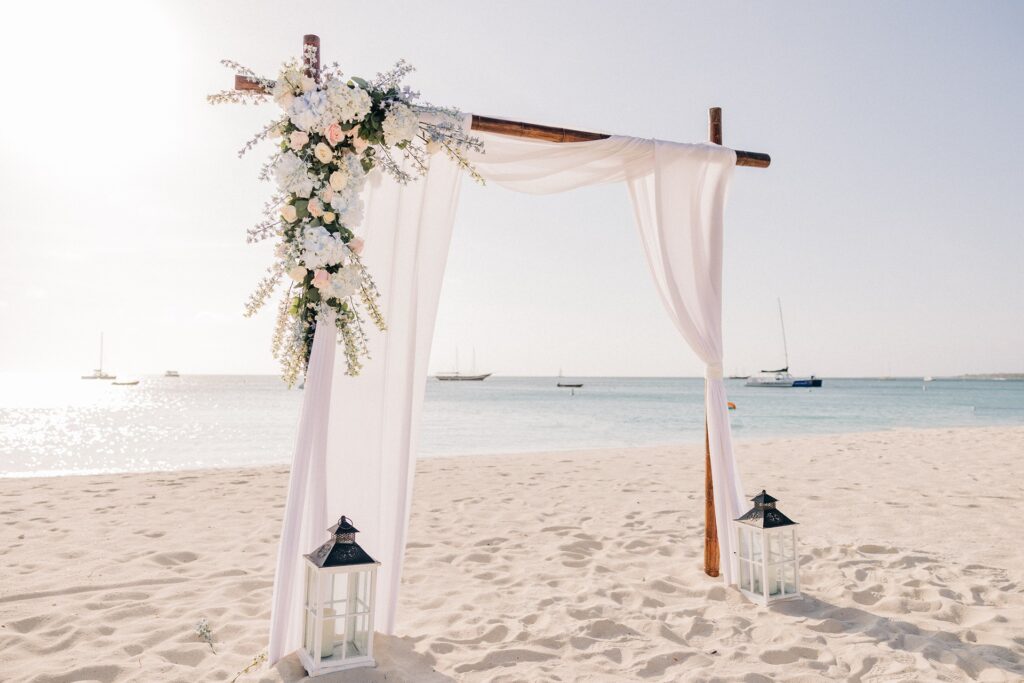 Aruba wedding arch for ceremony with florals