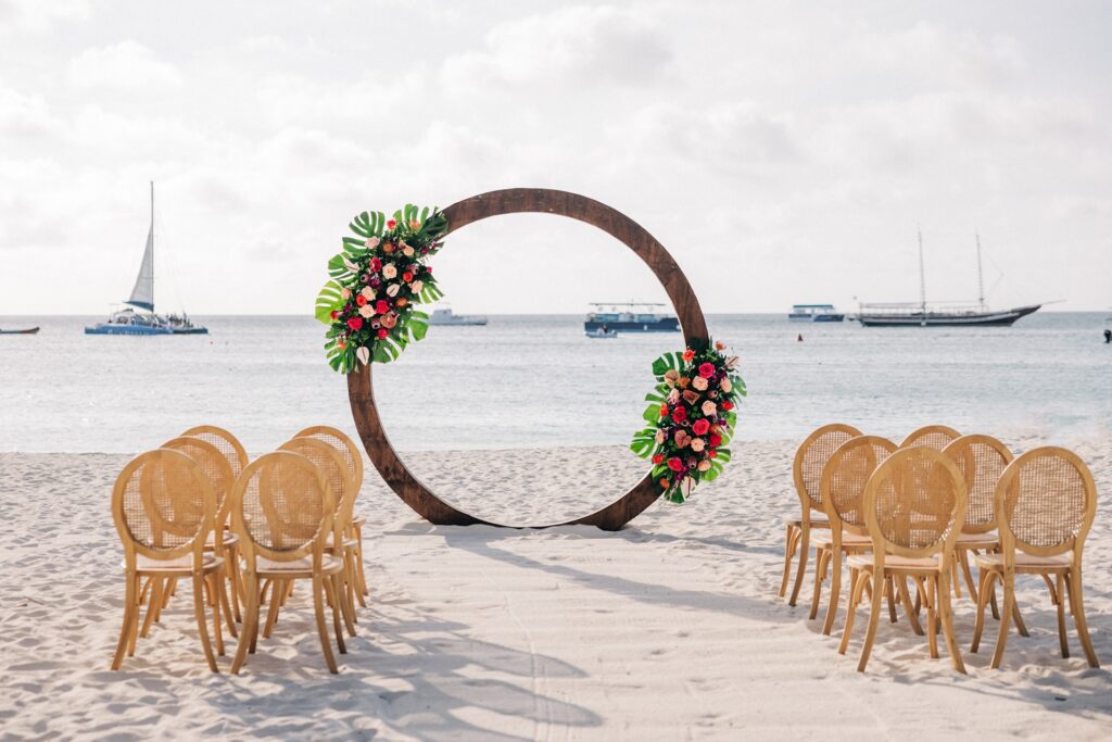Aruba wedding ceremony with wooden circle alter