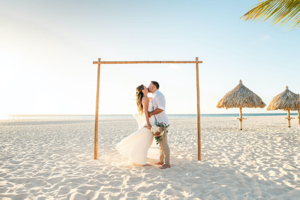 Bride and groom kissing after Aruba elopement ceremony