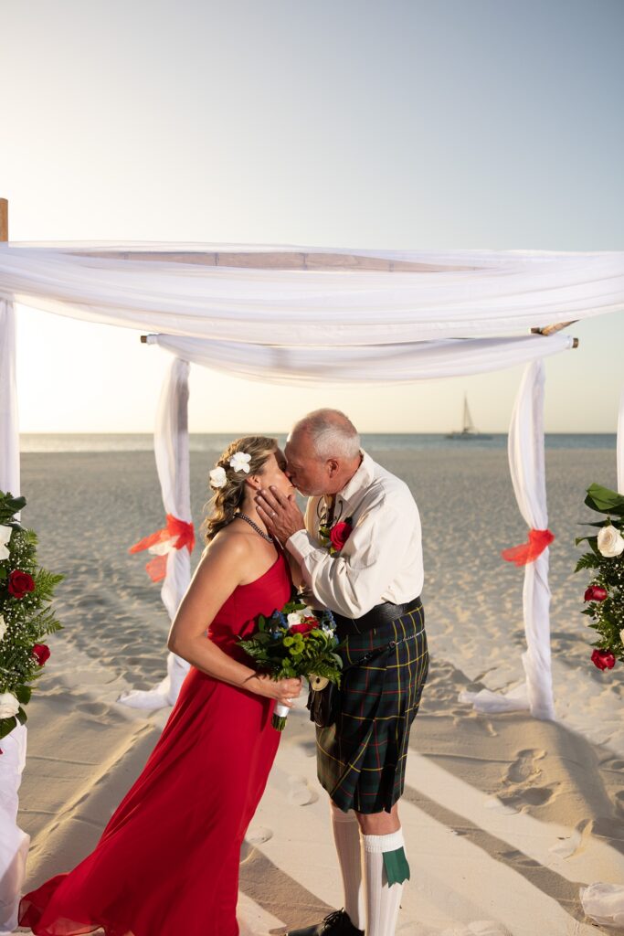 Bride and groom kissing at Aruba wedding
