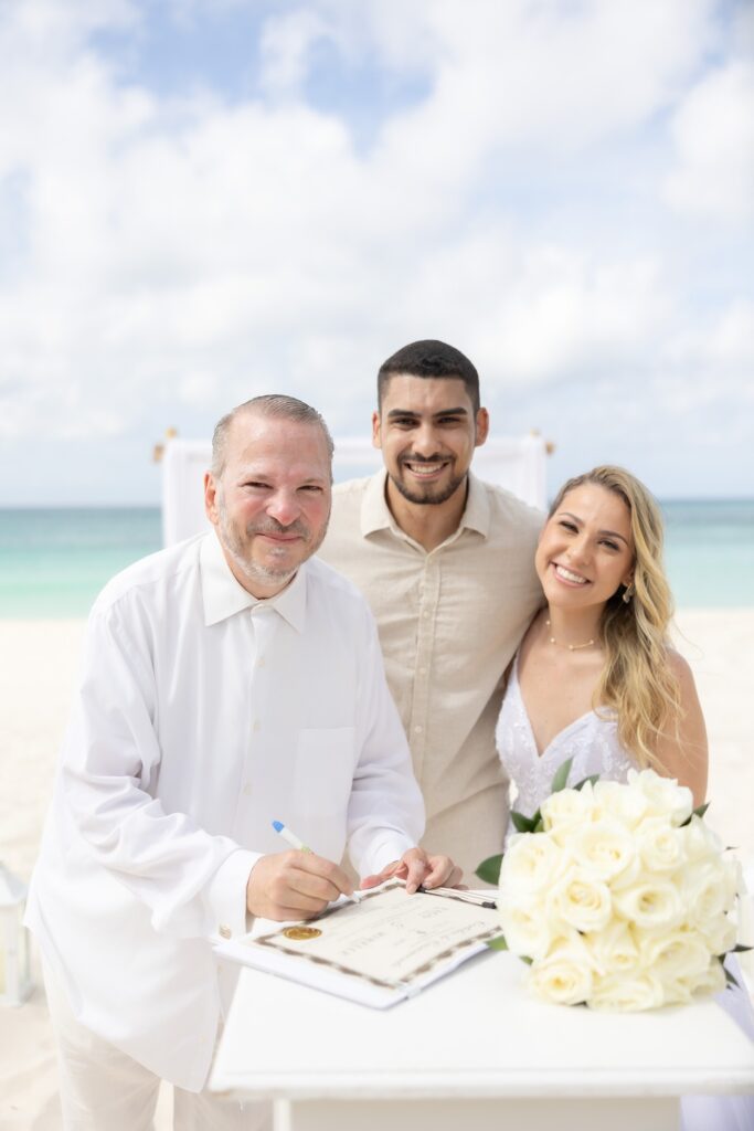 Aruba officiant with wedding license and couple