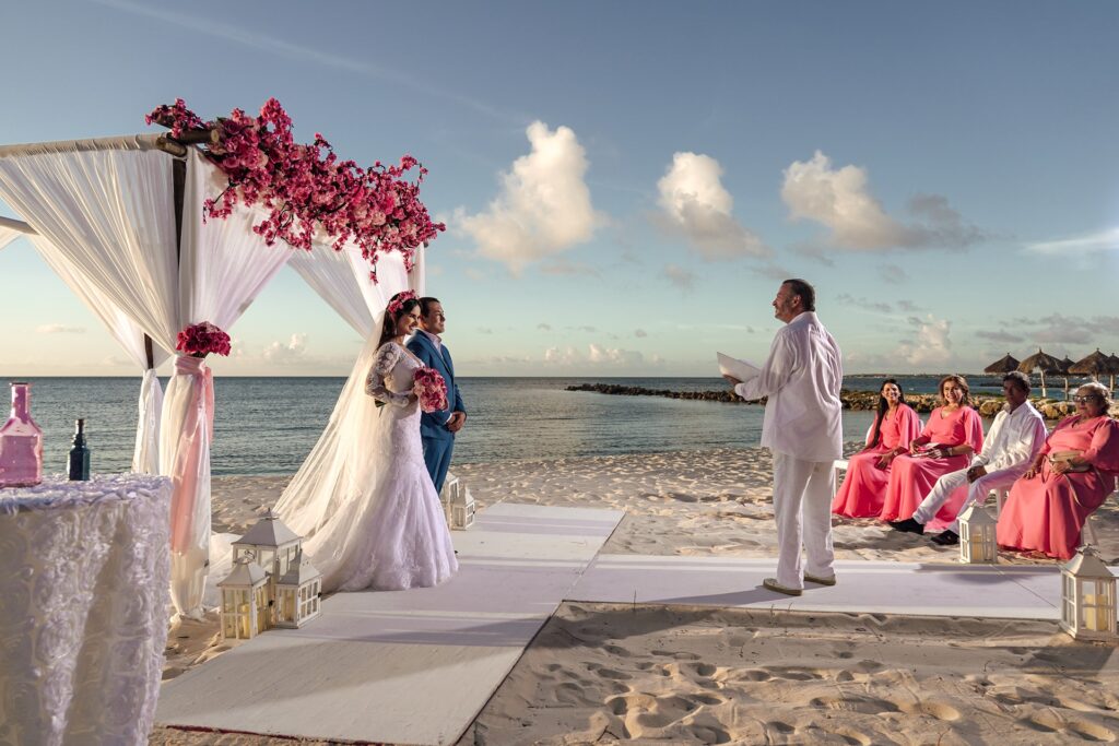 Aruba elopement wedding officiant speaking to bride and groom at ceremony