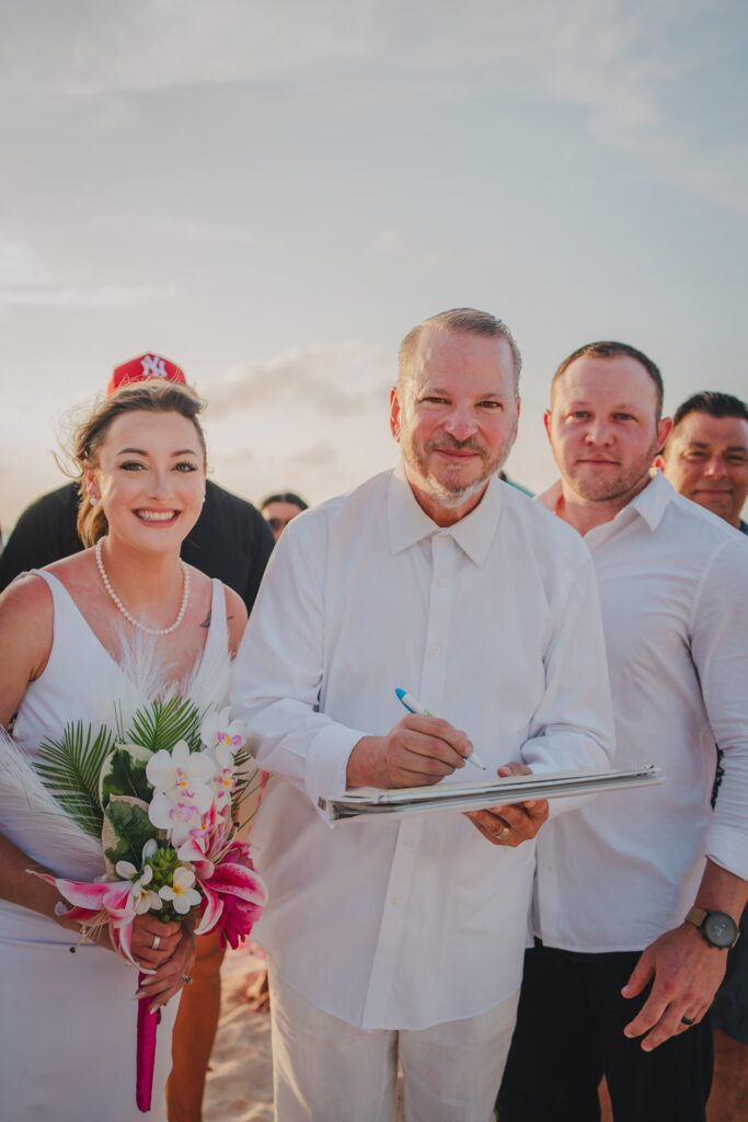 Aruba officiant with marriage license and couple
