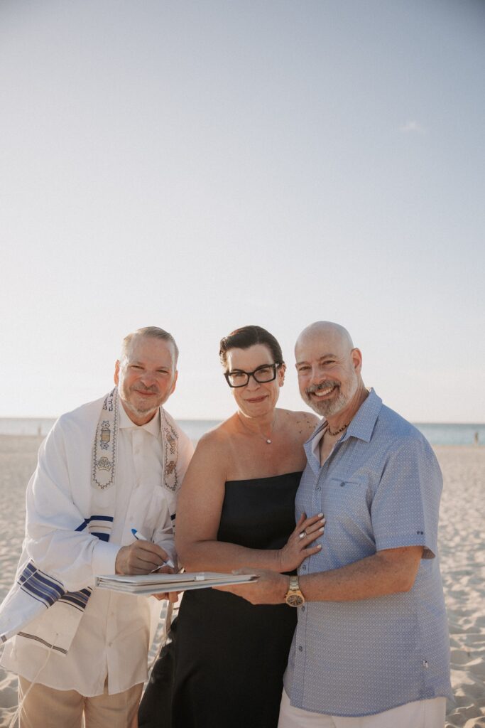 Aruba officiant with bride and groom at wedding