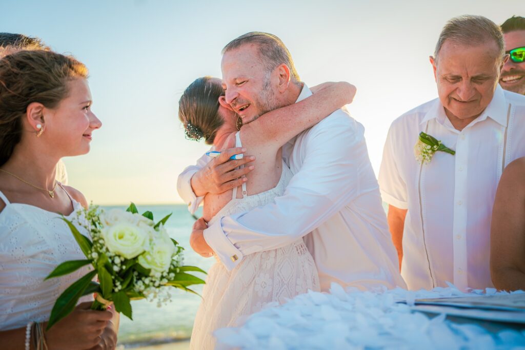 Aruba officiant hugging bride