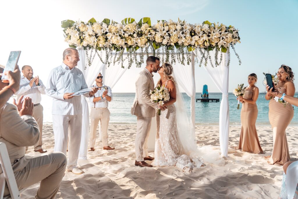 Bride and groom first kiss at Aruba wedding