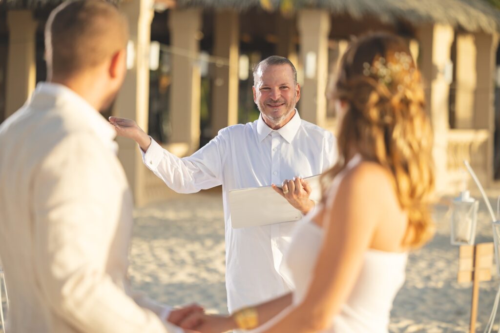 Aruba officiant with couple at elopement